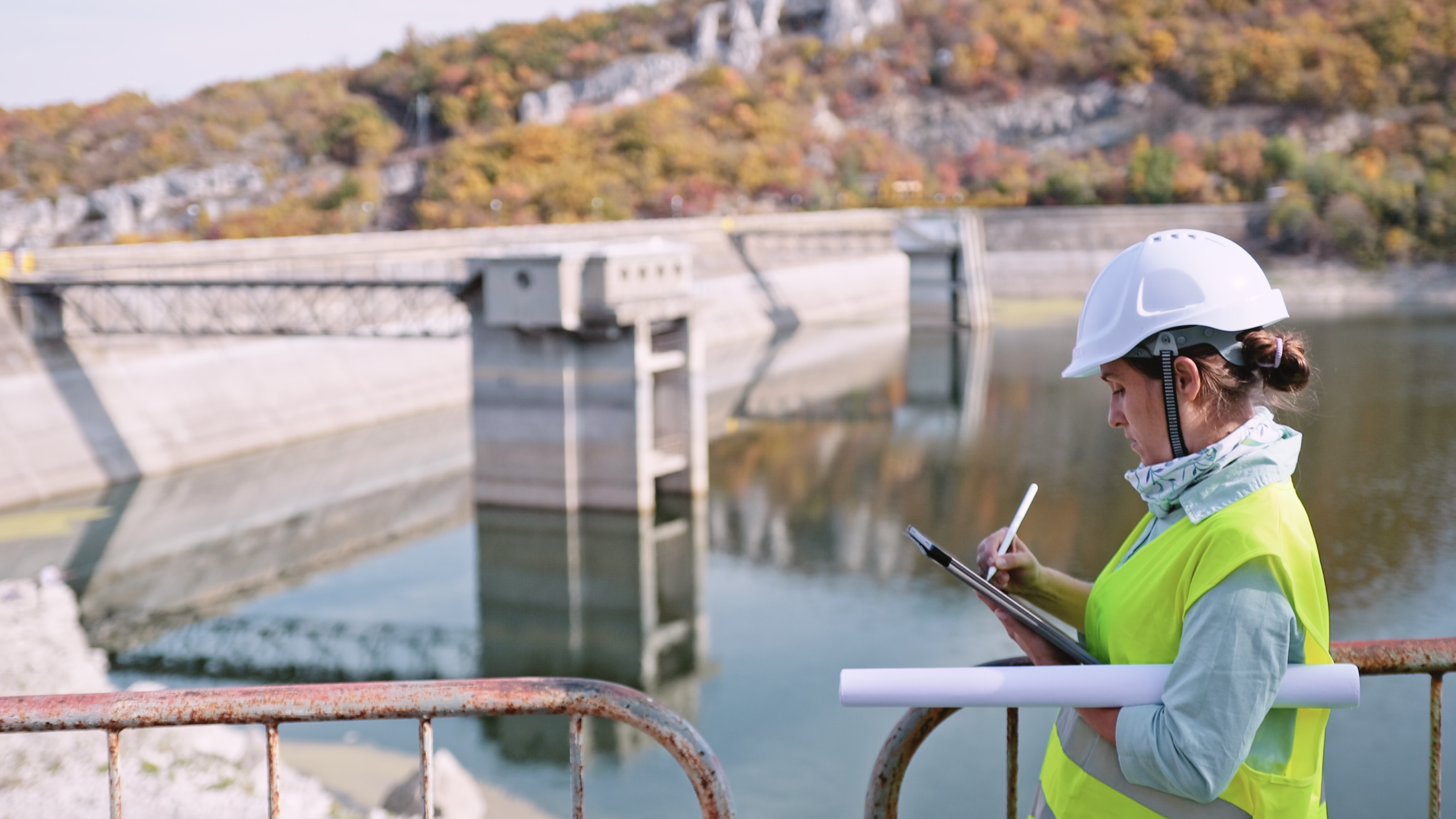 Maintenance female engineer working in hydroelectric power station